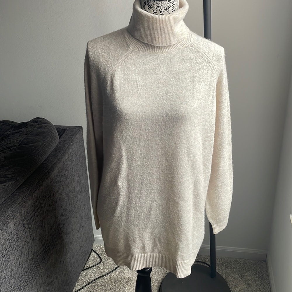 Beige long sleeve turtle neck sweater material dress